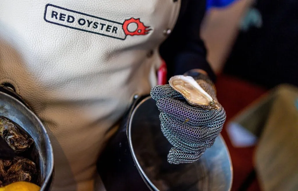 Oyster station with a shucker at an event